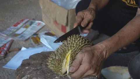 Durian is covered with a knife. 스톡 동영상 107779143