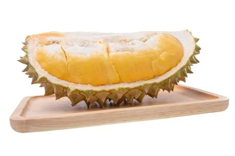 Durian on wooden plates Stock Photos