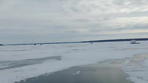 During the cold winter months, ice fishing becomes a popular activity on the fro 스톡 동영상 342580492