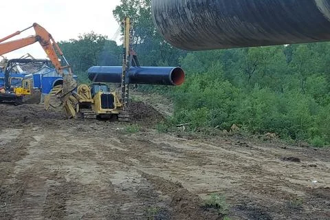 During construction work on gas pipelines in remote, areas, pipes are laid .. Fotos de archivo