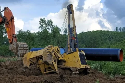During construction work on gas pipelines in remote, areas, pipes are laid .. 스톡 사진