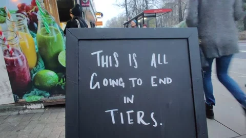 DURING LOCKDOWN A SIGN READS 'THIS IS ALL GOING TO END IN TIERS' LONDON UK 4K Stock Footage 144008195