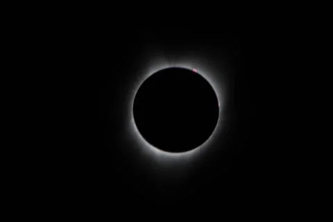 During the total solar eclipse, the Suns corona, only visible during the .. Stock Photos