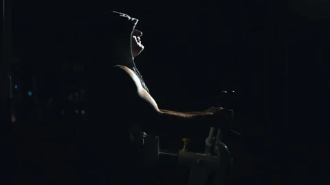 During training, athlete makes strength training. The athlete is engaged in Stock Footage 90036807