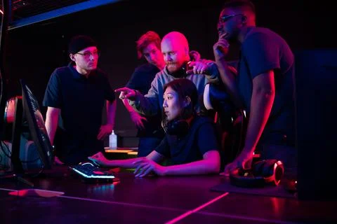 During a training session before the Dota 2 championship, the coach explains Stock Photos