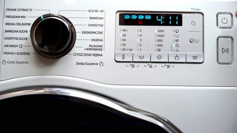 During washing, the washing machine is turned off with the power button. Stock Footage 232645188