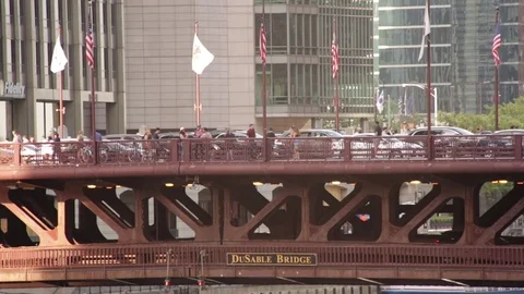DuSable Bridge in Chicago, Illinois. traffic and flags Stock Footage 82530733