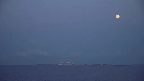 Dusk above the Perfect Day at Coco Cay island, cruise ship docked Stock Footage 137112024