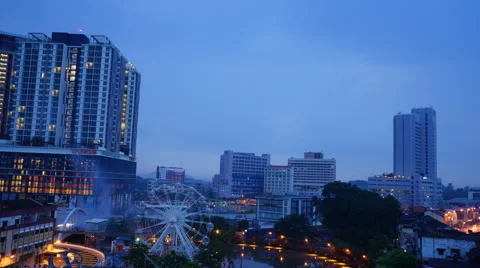 Dusk aerial time-lapse view of "Eye On Malacca" ferris wheel and "Malacca River Stock Footage 53879093