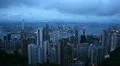 Dusk Aerial View of Hong Kong Island Skyline, Victoria Harbour, Kowloon Twilight HD Footage