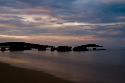 Dusk after a sunset at a beach Stock Photos