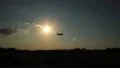 Dusk, airplane flying at sunset, silhouette basic. HD Footage
