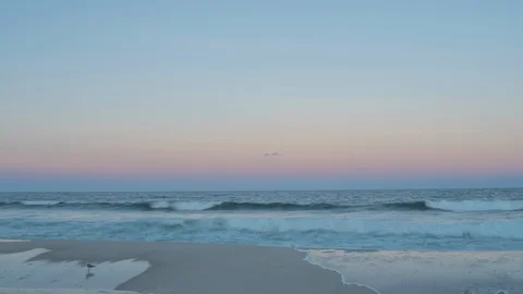 Dusk at beach or ocean with waves, 4K Scenic Timelapse Vídeo Stock 99396957