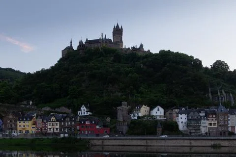 Dusk is breaking over Cochem in the Eifel valley Stock Photos