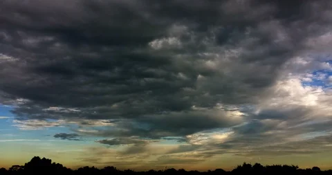 Dusk Clouds Receding (2160p 23.976) Stock Footage 105679622