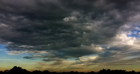 Dusk Clouds Receding (2160p 25fps) Stock Footage 105680588
