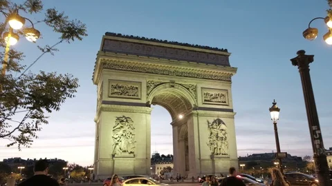 Dusk Dolly Forward Push In Arc De Triomphe Thru Sidewalk Trees Paris Stock Footage 93239787