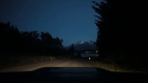Dusk driving with mountains ahead. Stock Footage 70342296