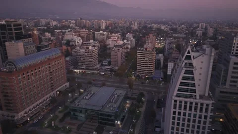 Dusk drone drift over Apoquindo civic and office blocks Santiago Chile Vídeos de archivo 334637380