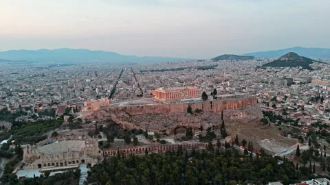 Dusk Drone Orbit of Acropolis of Athens Complex and Urban Grid Stock Footage 342574258