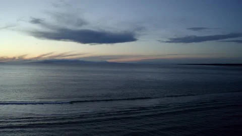 Dusk drone over ocean with low level moody sky Stock Footage 167452349