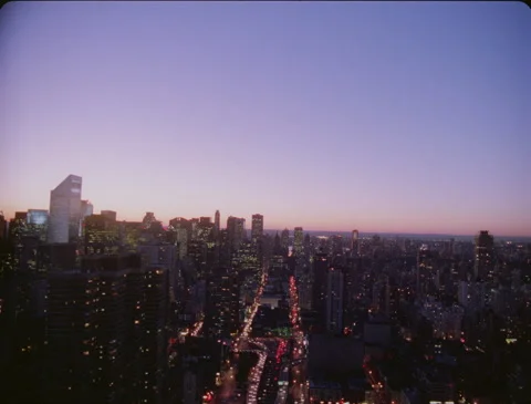 Dusk erials over Mid-town NYC 1989 35mm Film 動画素材 136069177