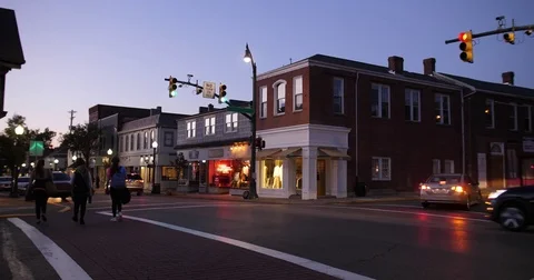 Dusk Establishing Shot of Typical American Small Town Main Street Corner Stock Footage