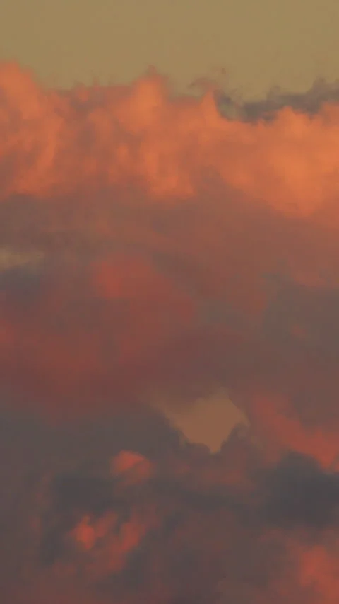 Dusk Fading Sundown, Vertical Thick Orange Cumulus Sky Shorts Reels Video stock 320834740