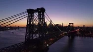 Dusk Flying Left Over Williamsburg Bridge With Manhattan Skyline In Background Stock Footage