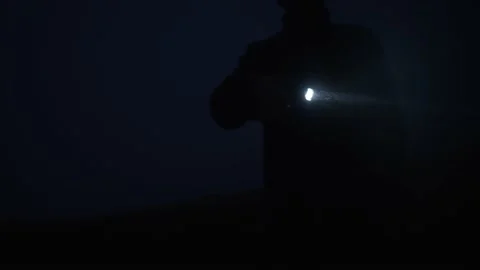 Dusk, lantern in hand. A search operation in the fog. Night walk. flashlight Stock Footage 228964213