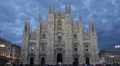 Dusk Light Night People Crowds Walking Passing Milan Duomo Square Cathedral Lit HD Footage