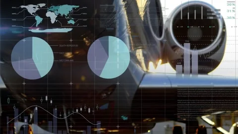 Dusk-lit apron opening view, data overlays sliding around jet engine intake for Stock Footage 319682181