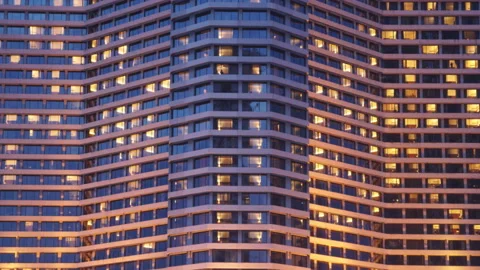 Dusk to night timelapse of modern building in city at night . Video stock 203037529
