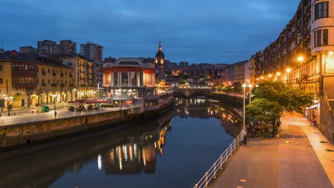 Dusk to Night Timelapse View of Bilbao Cityscape, Basque Country, Spain Stock Footage 250800019