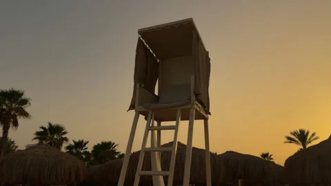 Dusk Over Deserted Surfside Tower. Calm Beach Scene With Empty Lookout And Stock Footage 337938757