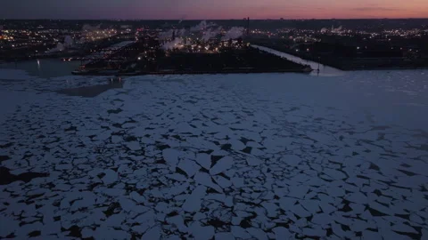 Dusk Over Hamilton Harbor: Winter Ice Patterns Create Serene Atmosphere Stock Footage 332209870