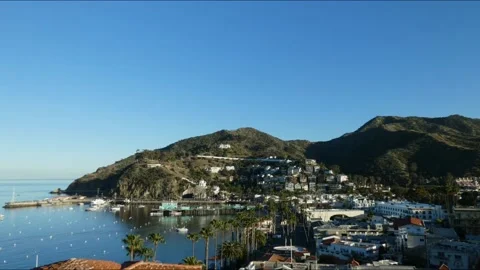 Dusk over a harbor town. Stock Footage 172602595