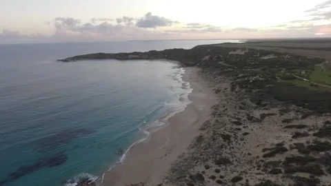 Dusk over isolated beach Stock Footage 274866440