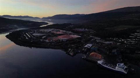 Dusk over pulp mill and shipping yard, Corpach, Fort William, Scottish Highlands Stock Footage 330528370