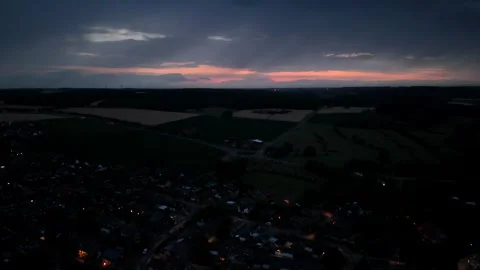 Dusk scene after sunset in small american village and farm fields in distance Stock Footage 313325983
