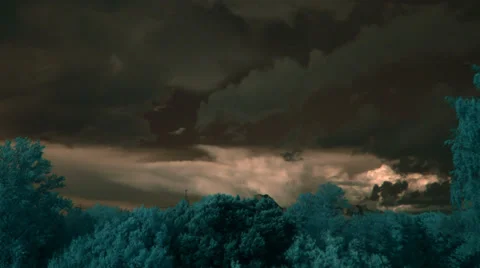 Dusk storm clouds, infrared time lapse t1362B Stock Footage 32897896