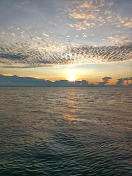 At dusk the sun sets. Stock Photos