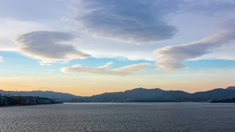 Dusk Sunset Clouds over mountain - Timelapse Stock Footage 97692825