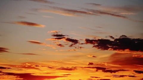 Dusk, Sunset Sky Clouds in the Evening with colorful Orange sunlight and Vídeo Stock 285542396