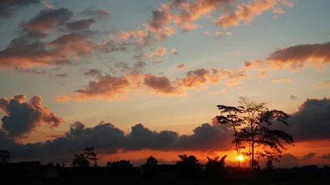 Dusk with thick clouds over residential areas Stock Photos