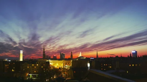 Dusk time lapse with clouds over a city skyline Stock Footage 42152794