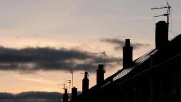 Dusk timelapse sky over chimneys and rooves 4K Stock Footage 85509306