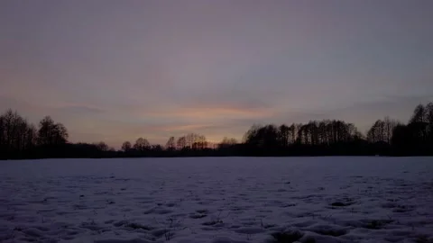 Dusk in a winter landscape - timelapse Stock Footage 150179846