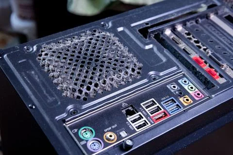 Dust accumulation on computer hardware in a home setting during the afternoon, Stock Photos