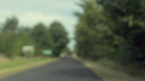 Dust and dirt on the windshield. Road out of focus. Video stock 68024283